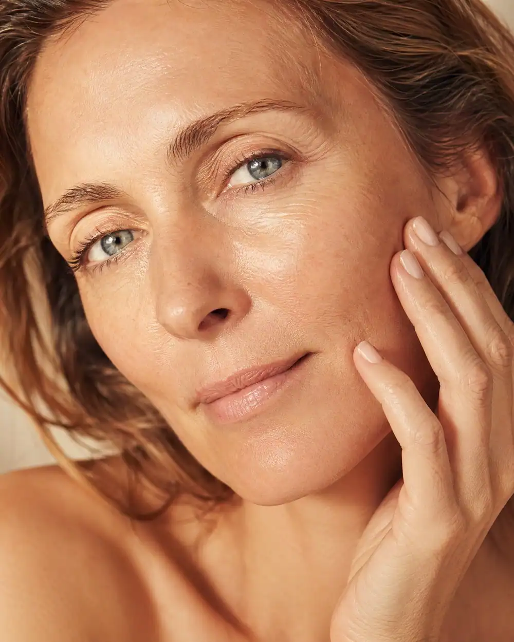 Editorial close-up of skin in warm natural light